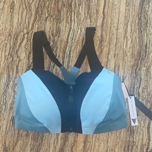 Victoria’s Secret sports bra with front zipper.